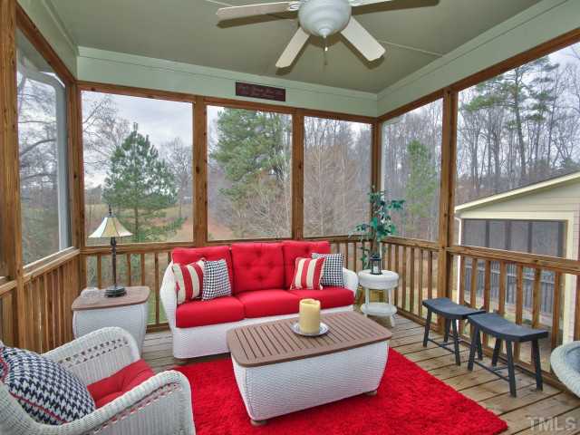 10149 Darling Street Raleigh, NC 27613 - Photo 21 of 25 a living room with furniture and a large window