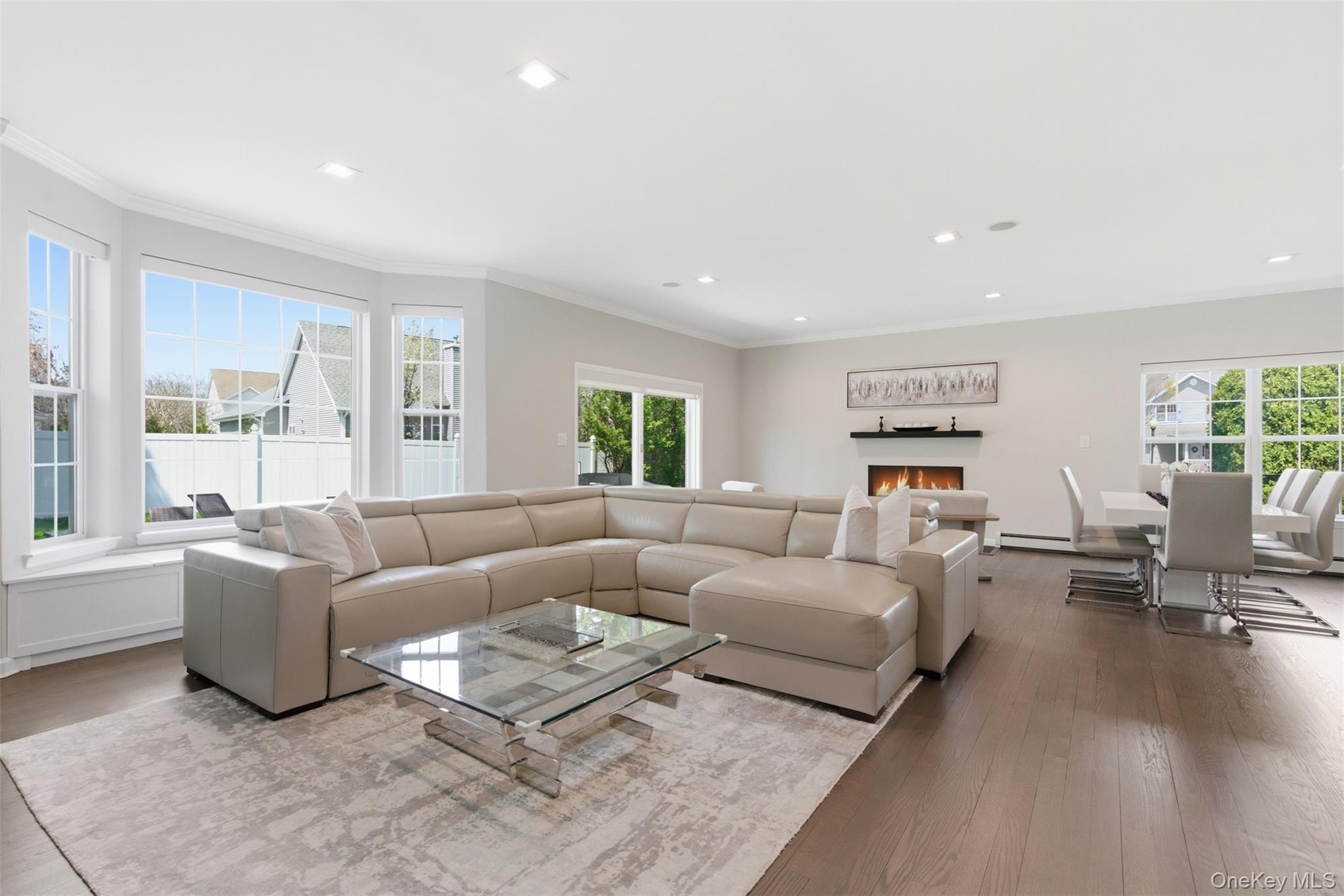 159 Rivendell Court Melville, NY 11747 - Photo 20 of 38 a living room with furniture and a large window