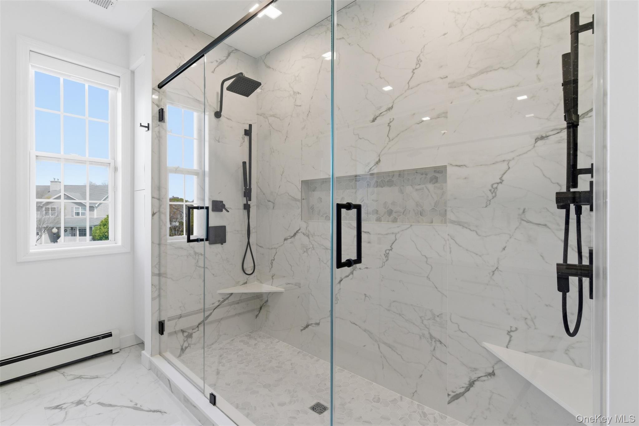 159 Rivendell Court Melville, NY 11747 - Photo 27 of 38 a bathroom with a shower
