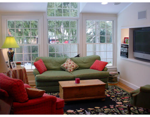 24 Oxford Road Wellesley, MA 02481 - Photo 3 of 9 a living room with furniture and a flat screen tv