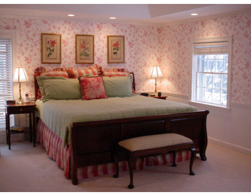24 Oxford Road Wellesley, MA 02481 - Photo 6 of 9 a bedroom with a bed a lamp and window