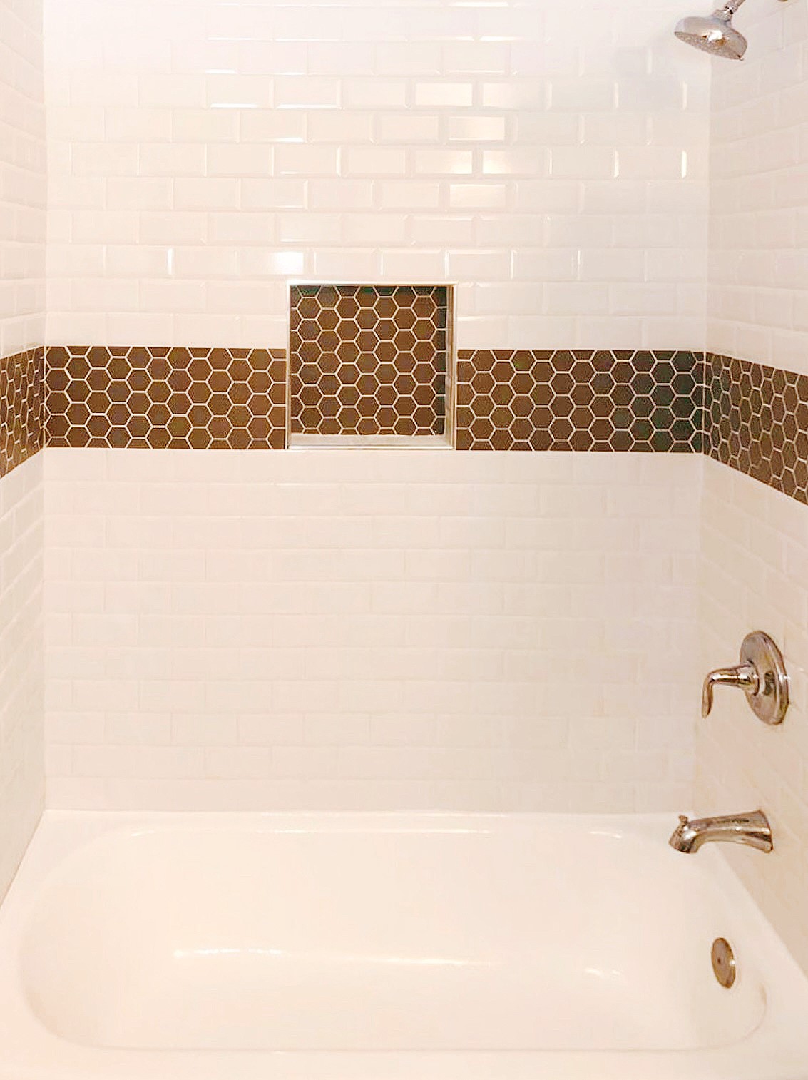 3271 Sul Ross Street, Unit 11 Houston, TX 77098 - Photo 11 of 12 a bathroom with a bathtub and a shower