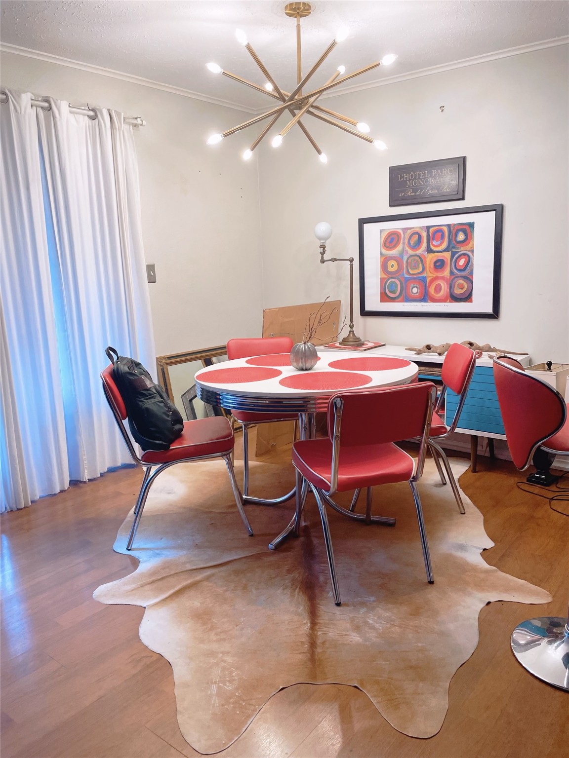 3271 Sul Ross Street, Unit 11 Houston, TX 77098 - Photo 6 of 12 a view of a dining room with furniture and wooden floor