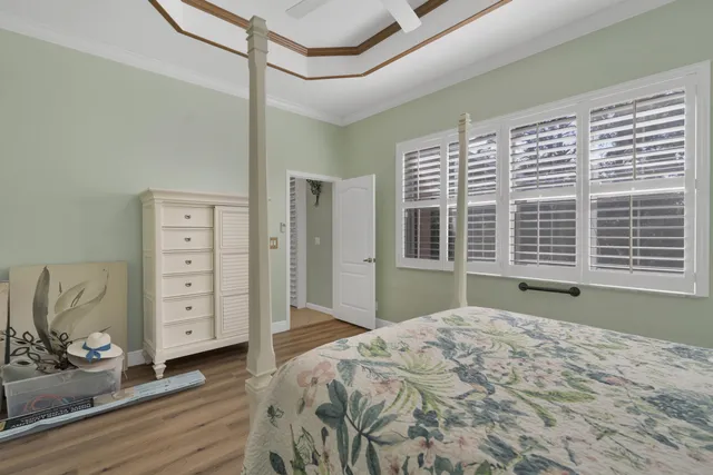 a bedroom with a bed and a stove