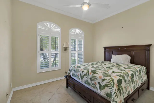 a view of a workspace with furniture and wooden floor