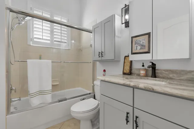 a view of a dining room with furniture window and outdoor view