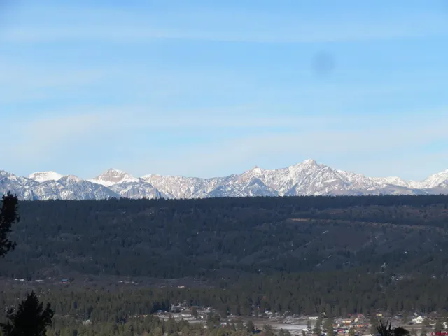 a view of mountain with lake view