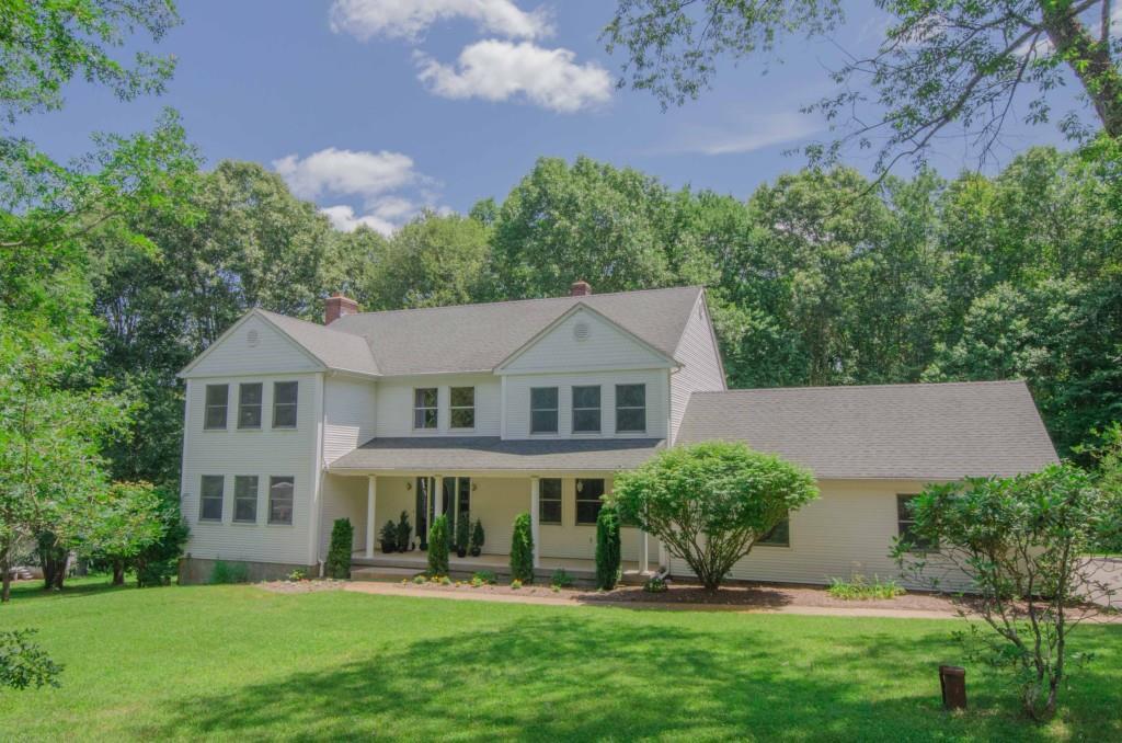 112 Pinebrook Road Colchester, CT 06415 - Photo 1 of 1 front view of a house with a yard