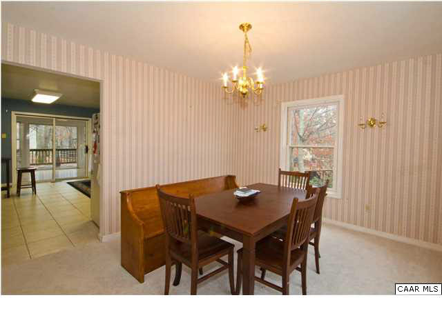 60 Laguna Road Palmyra, VA 22963 - Photo 6 of 25 a view of a dining room with furniture and chandelier