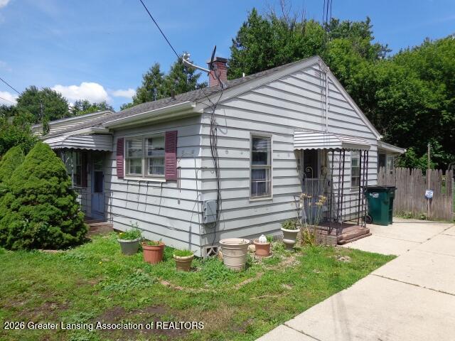216 West Jolly Road Lansing, MI 48910 - Photo 3 of 24 Front Side