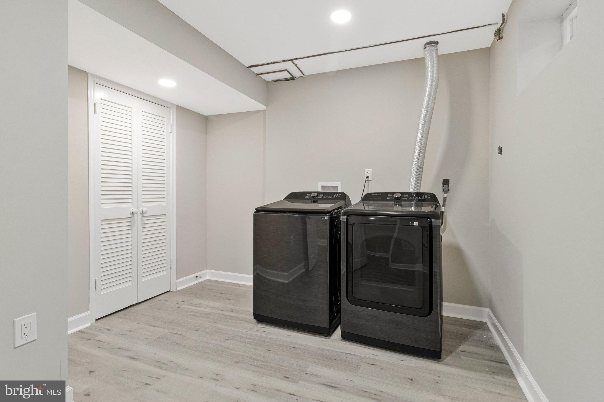 7269 Evanston Road Springfield, VA 22150 - Photo 30 of 41 a utility room with washer and dryer