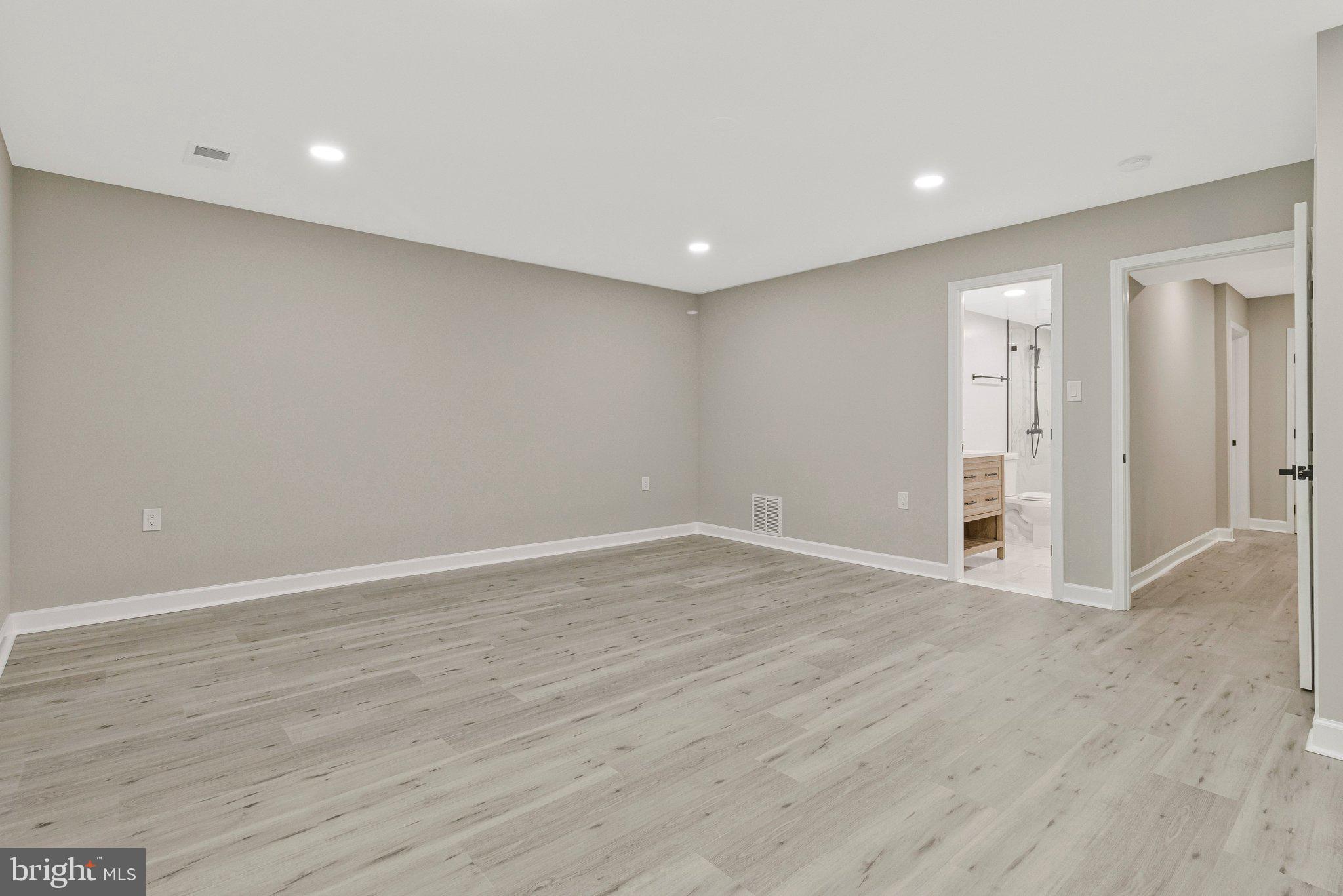 7269 Evanston Road Springfield, VA 22150 - Photo 34 of 41 a view of an empty room with wooden floor