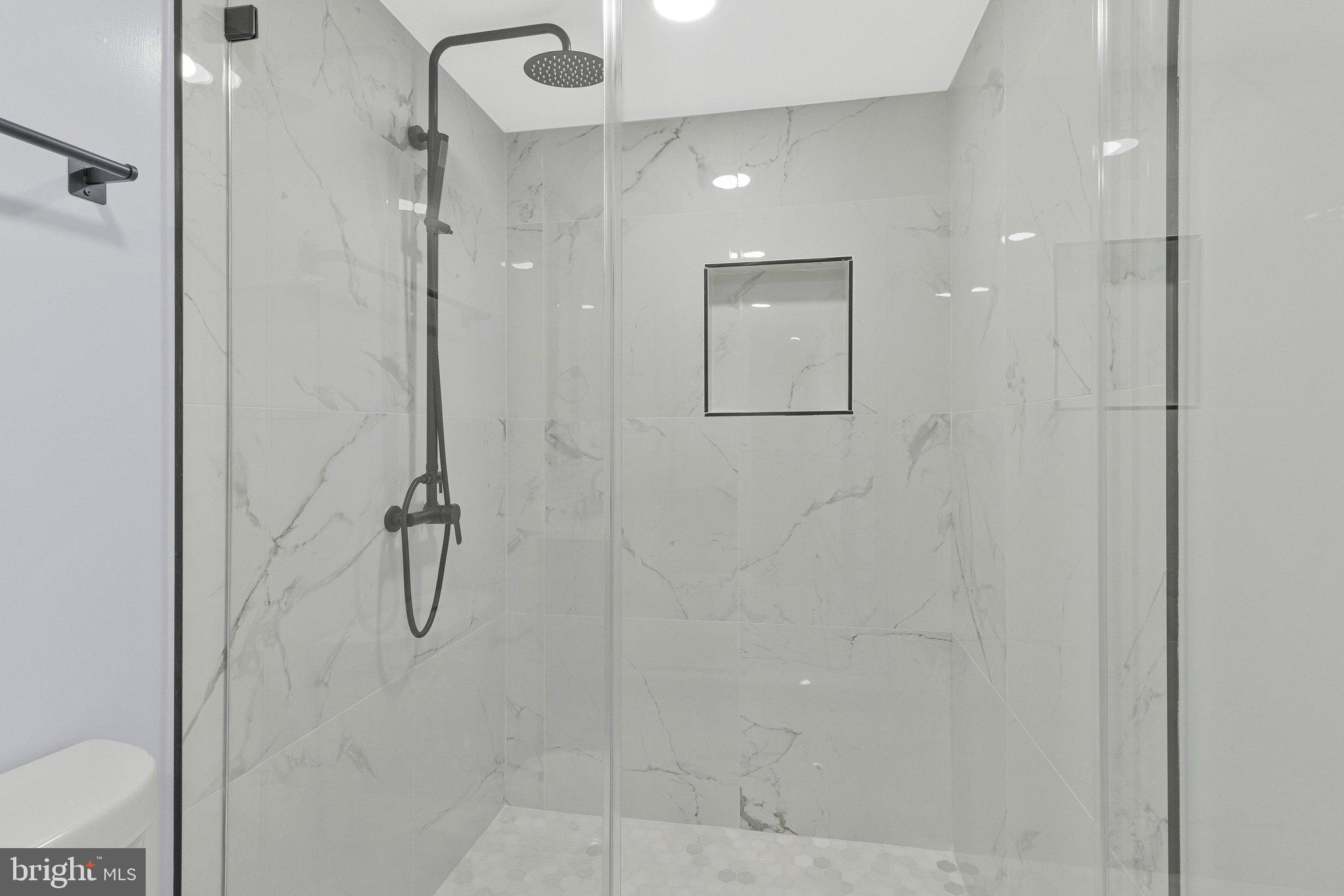 7269 Evanston Road Springfield, VA 22150 - Photo 37 of 41 a bathroom with a shower