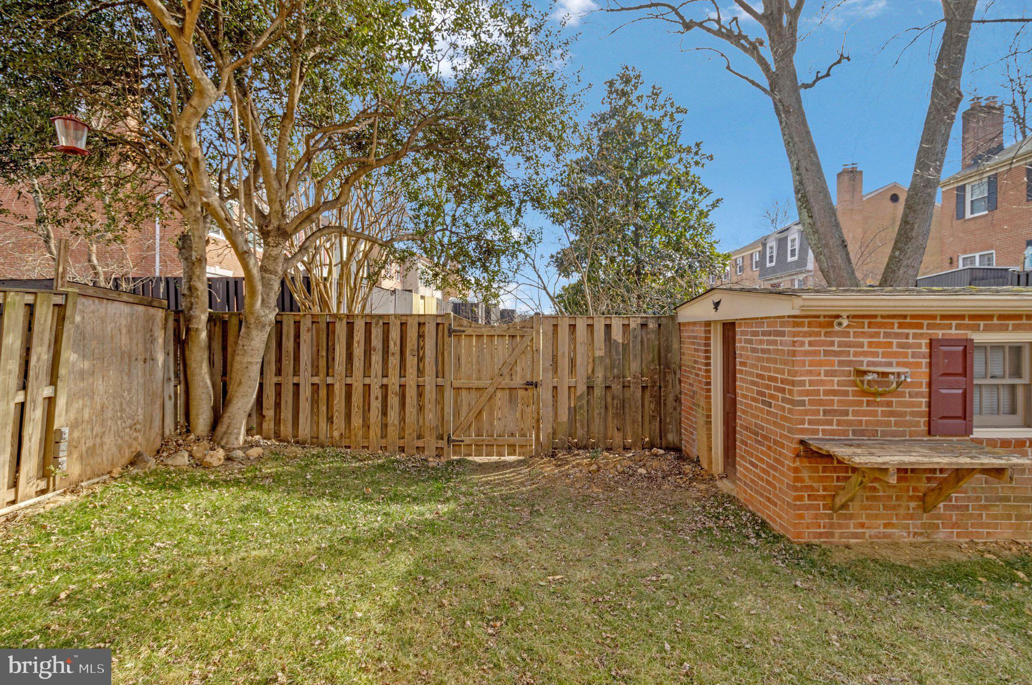 7269 Evanston Road Springfield, VA 22150 - Photo 38 of 41 a view of backyard with wooden fence