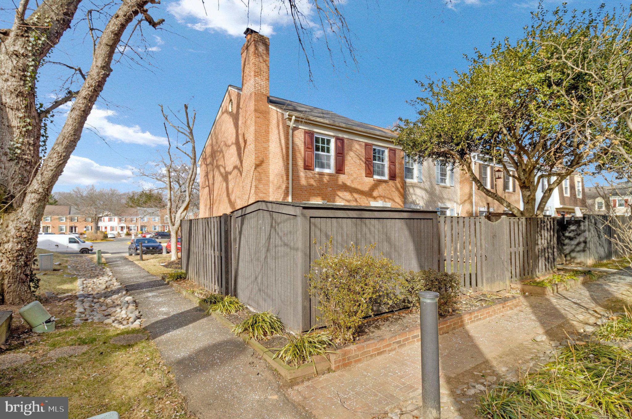 7269 Evanston Road Springfield, VA 22150 - Photo 39 of 41 a view of a street with wooden fence