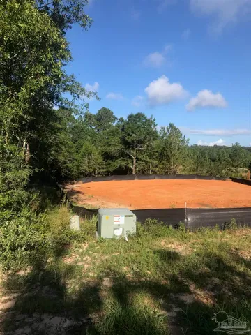 a view of a lake from a yard