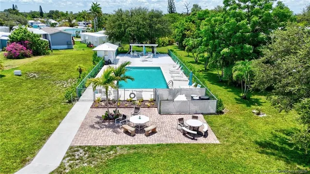 a view of yard from outdoor seating