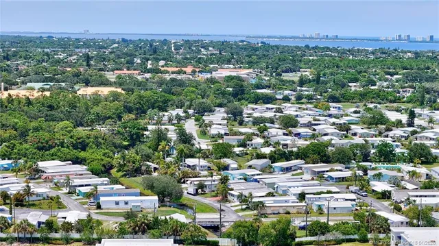 an aerial view of a city with lots of residential buildings