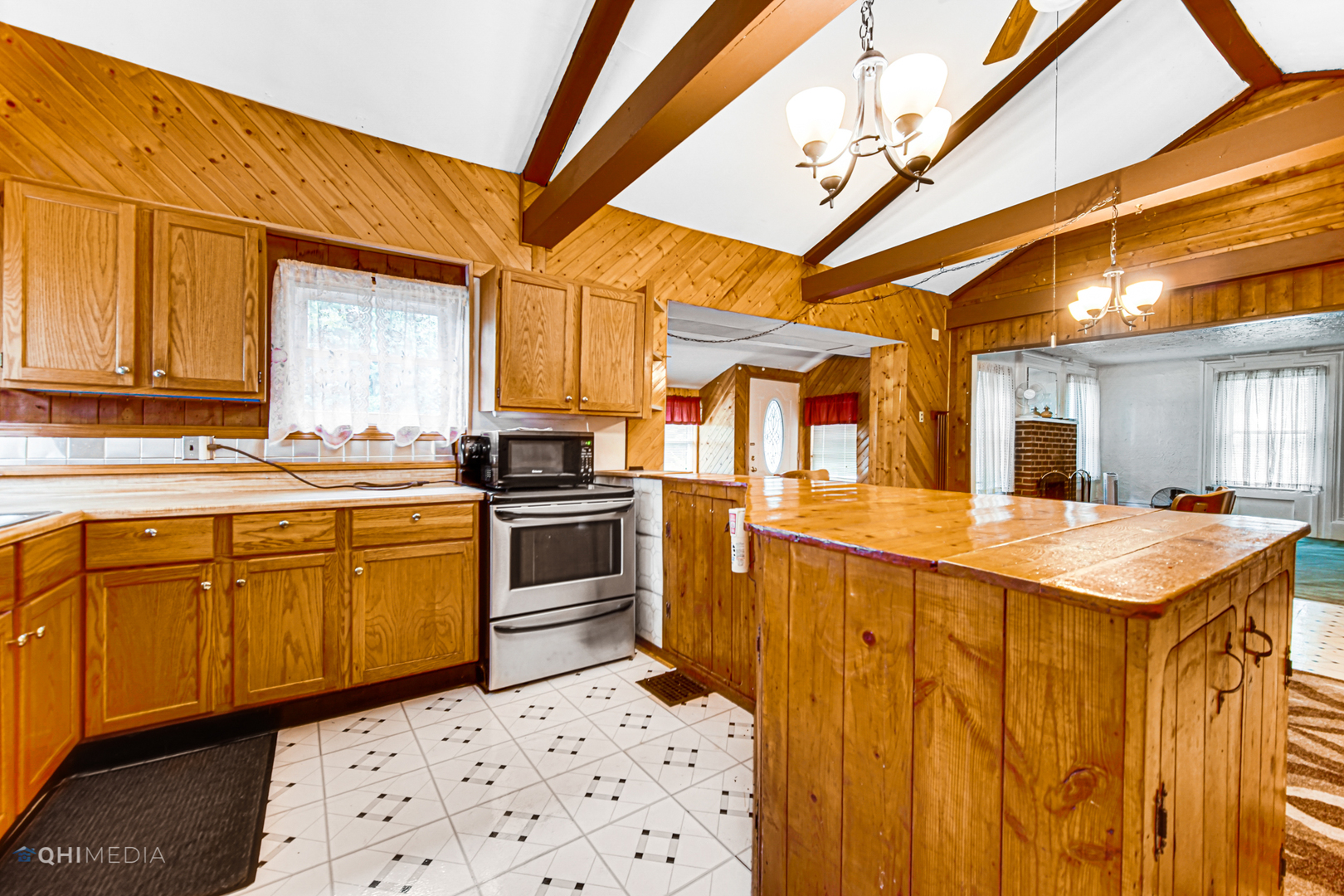 275 West Richton Road Steger, IL 60475 - Photo 12 of 35 a kitchen with stainless steel appliances kitchen island granite countertop a sink and cabinets