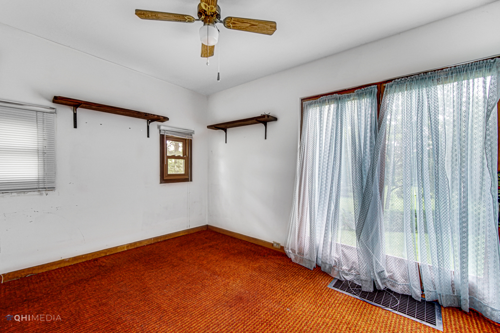 275 West Richton Road Steger, IL 60475 - Photo 20 of 35 a view of an empty room with a window