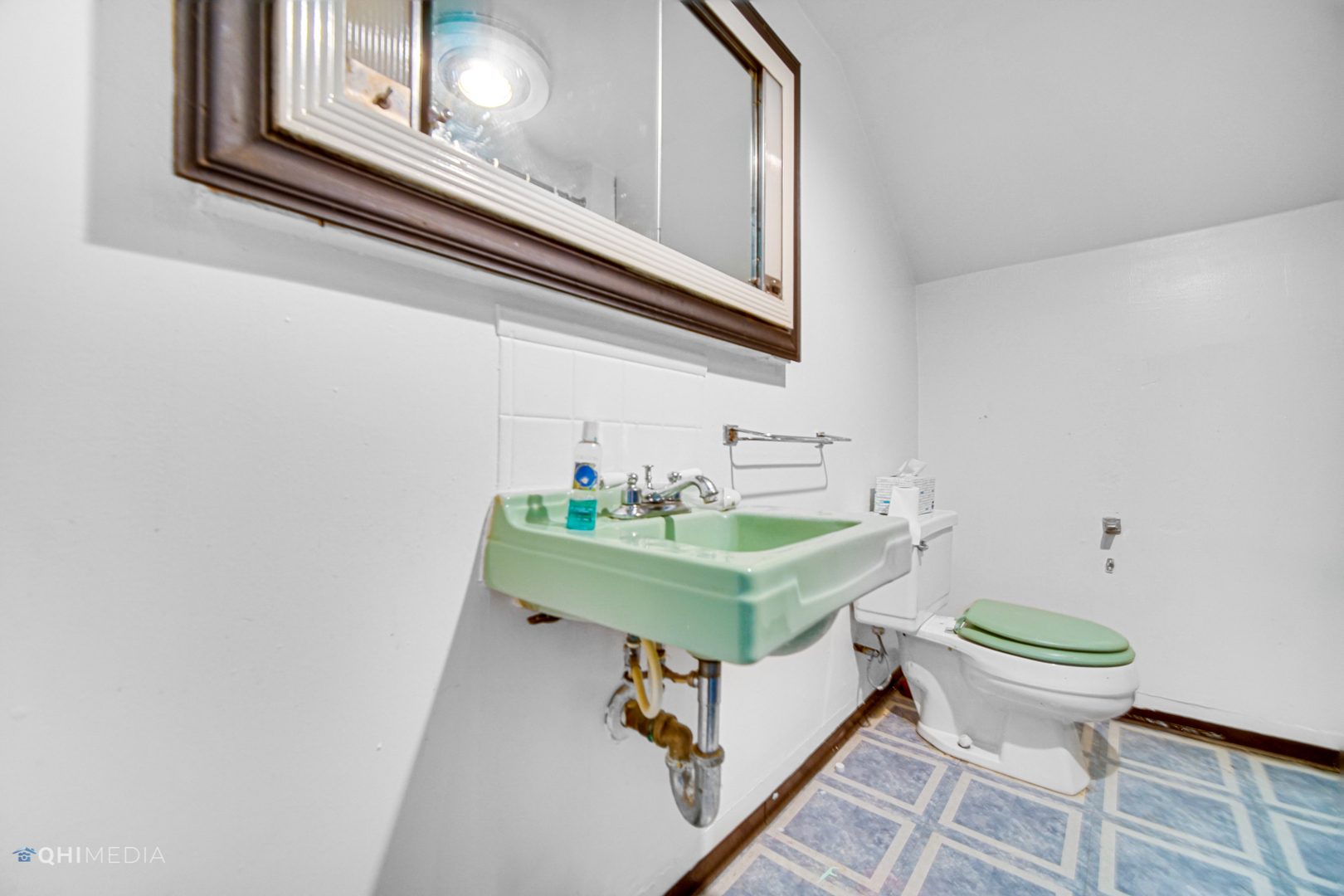 275 West Richton Road Steger, IL 60475 - Photo 27 of 35 a bathroom with a sink a toilet and mirror