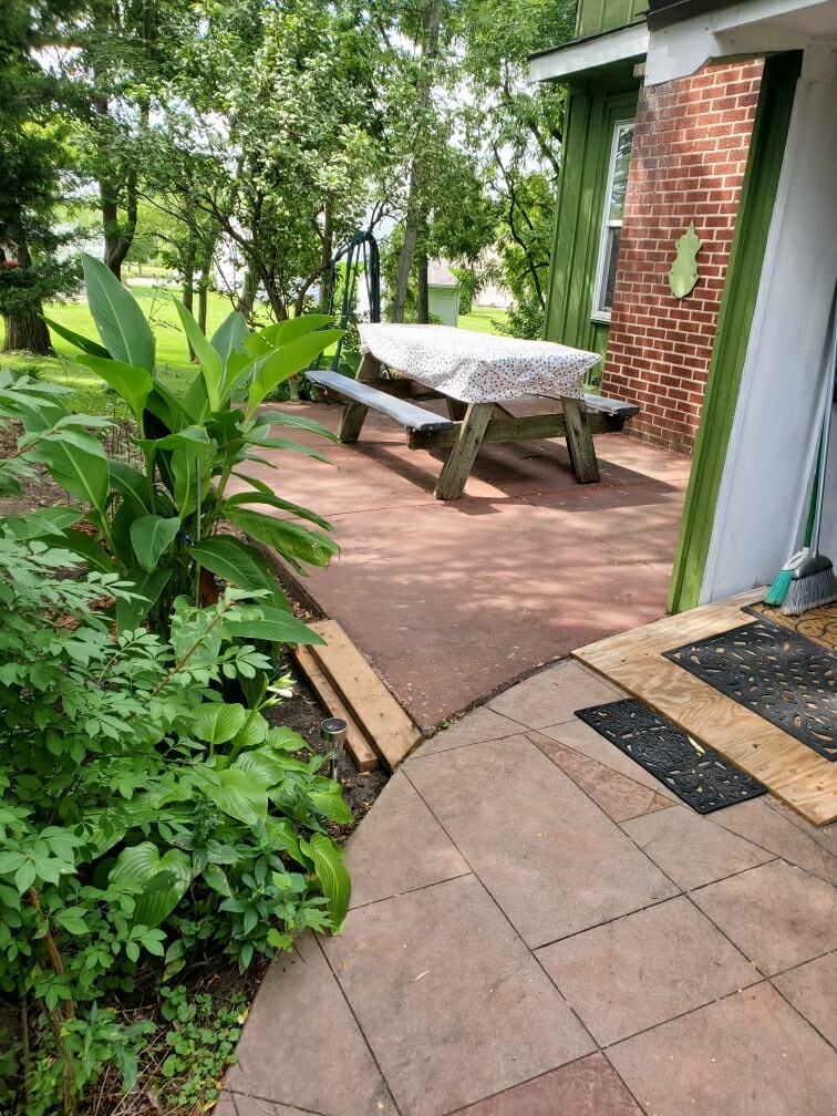 275 West Richton Road Steger, IL 60475 - Photo 4 of 35 a roof deck with table and chairs and potted plants