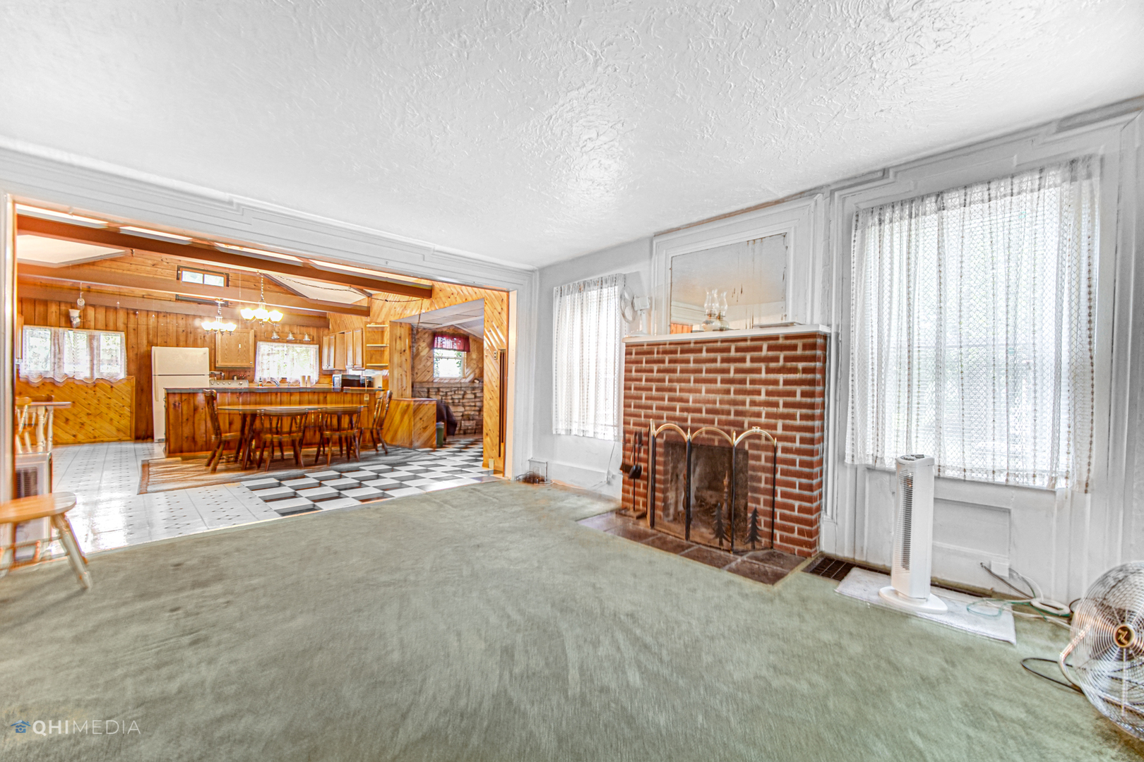 275 West Richton Road Steger, IL 60475 - Photo 10 of 35 an empty room with fireplace and windows