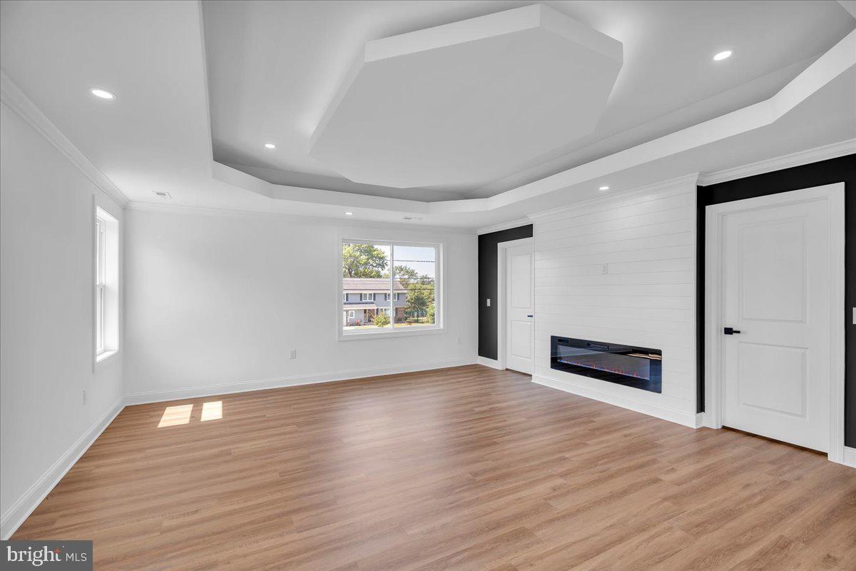 2504 Church Road Cinnaminson, NJ 08077 - Photo 27 of 79 an empty room with wooden floor and windows