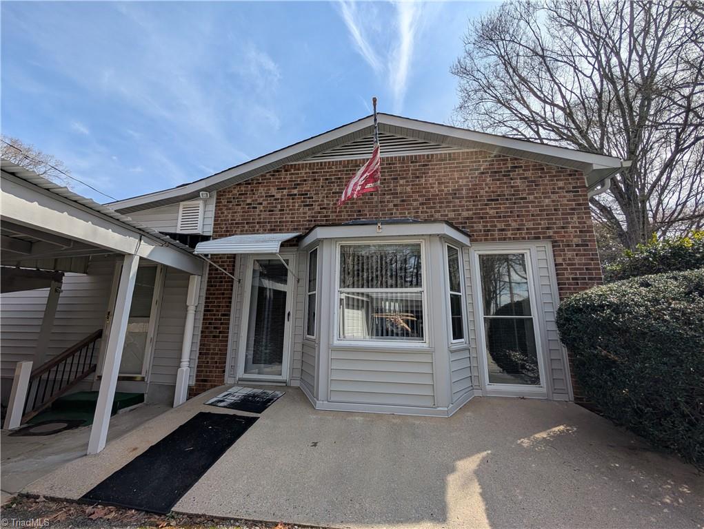 8304 Mccrory Road Stokesdale, NC 27357 - Photo 3 of 27 Side entry