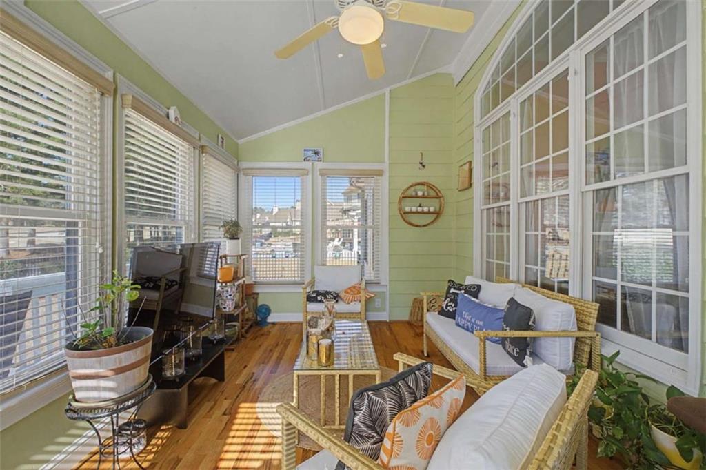 9620 Coastal Pointe Drive Villa Rica, GA 30180 - Photo 27 of 65 a living room with patio furniture and a large window