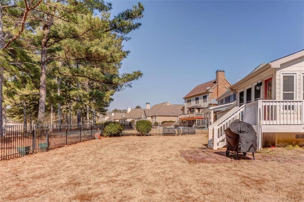 9620 Coastal Pointe Drive Villa Rica, GA 30180 - Photo 54 of 65 a view of a house with a snow in the yard