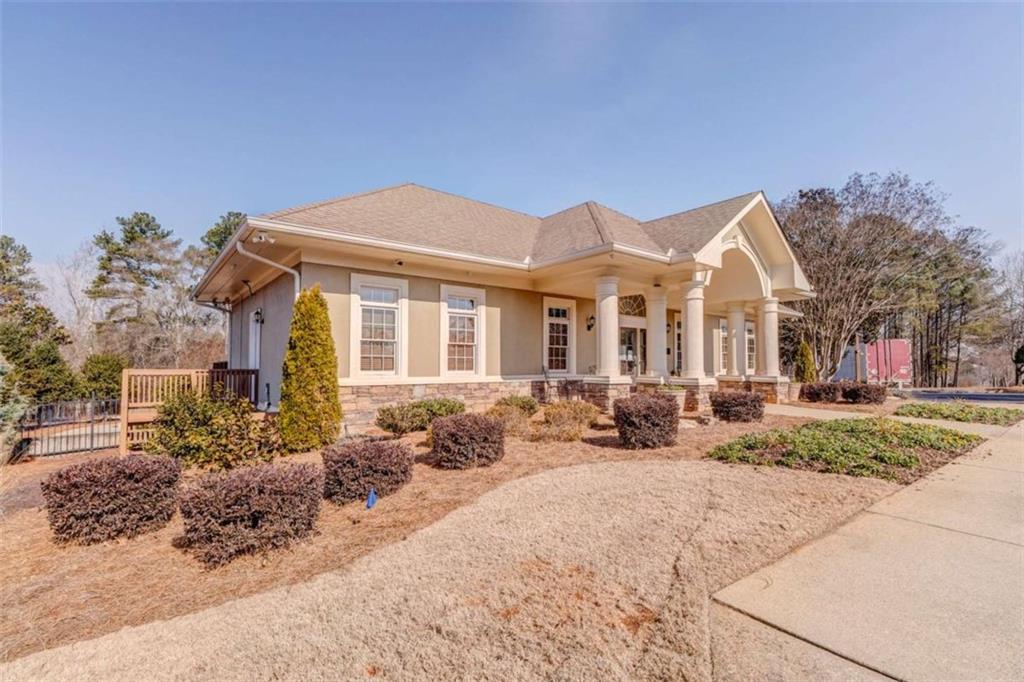 9620 Coastal Pointe Drive Villa Rica, GA 30180 - Photo 61 of 65 a front view of house with yard outdoor seating and barbeque oven