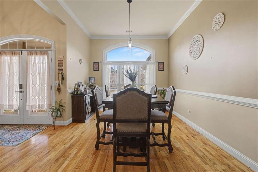 9620 Coastal Pointe Drive Villa Rica, GA 30180 - Photo 8 of 65 a view of a dining room with furniture window and wooden floor