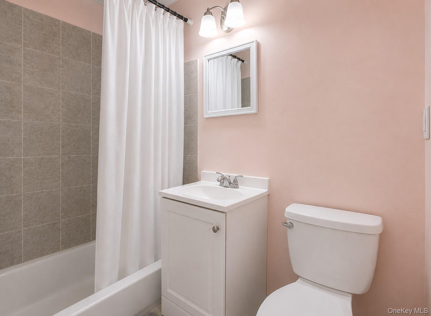 1 Windsor Road Monroe, NY 10950 - Photo 18 of 20 a bathroom with a toilet a sink and bathtub