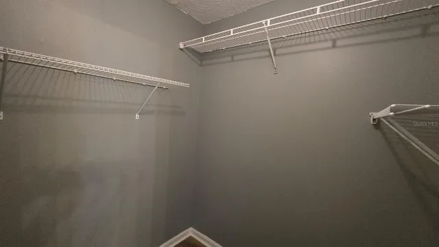 a bath tub sitting on a shelf in a bathroom