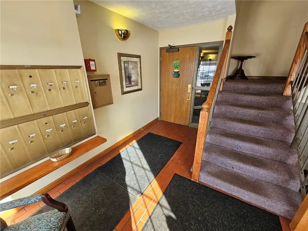 a view of a living room with wooden floor
