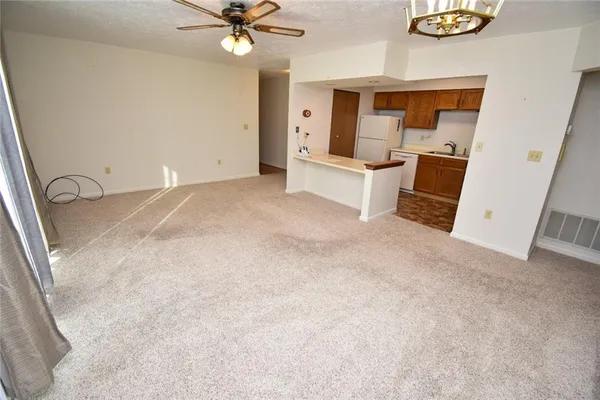 a view of a livingroom with a fireplace