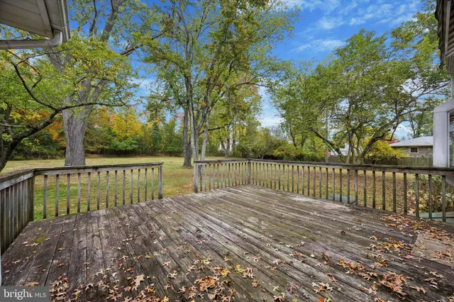 a view of deck with a fence