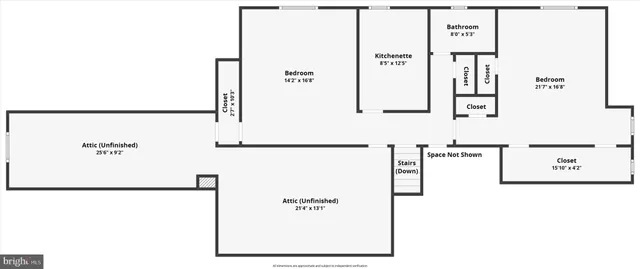 a picture of a bathroom with a refrigerator