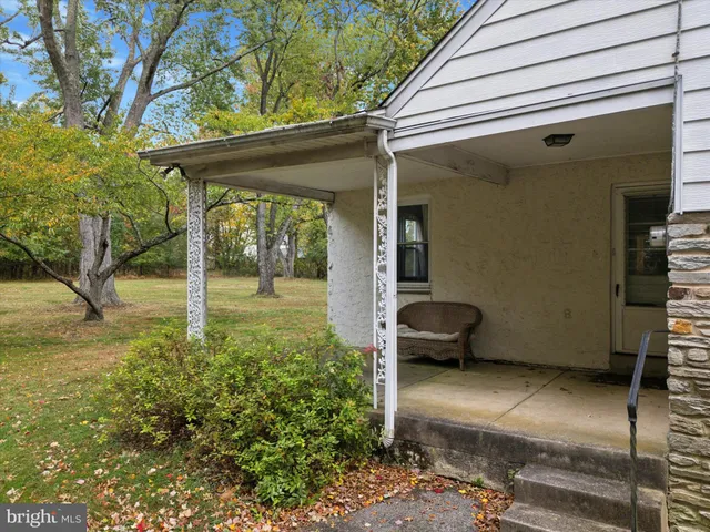 a view of a porch with garden