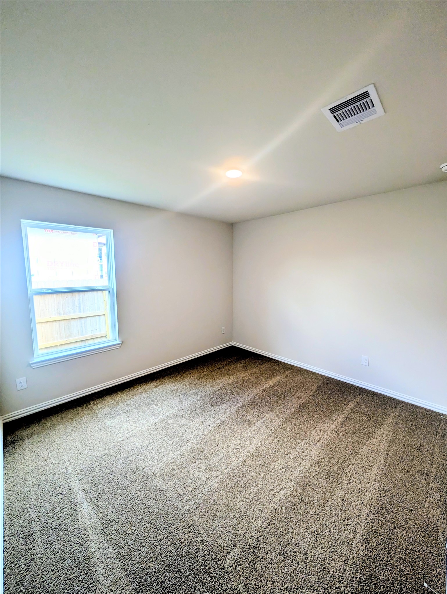 32314 Mimosa Ridge Lane Waller, TX 77484 - Photo 16 of 16 an empty room with windows