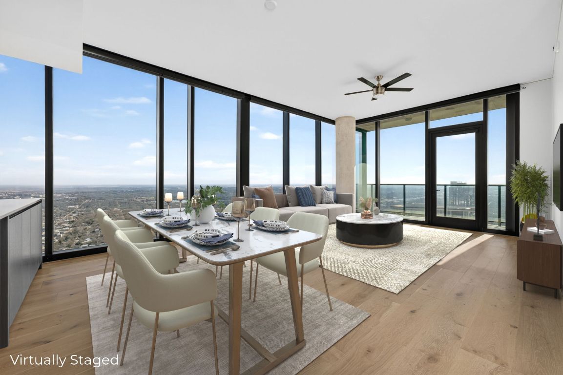 a view of a dining room with furniture window and outside view