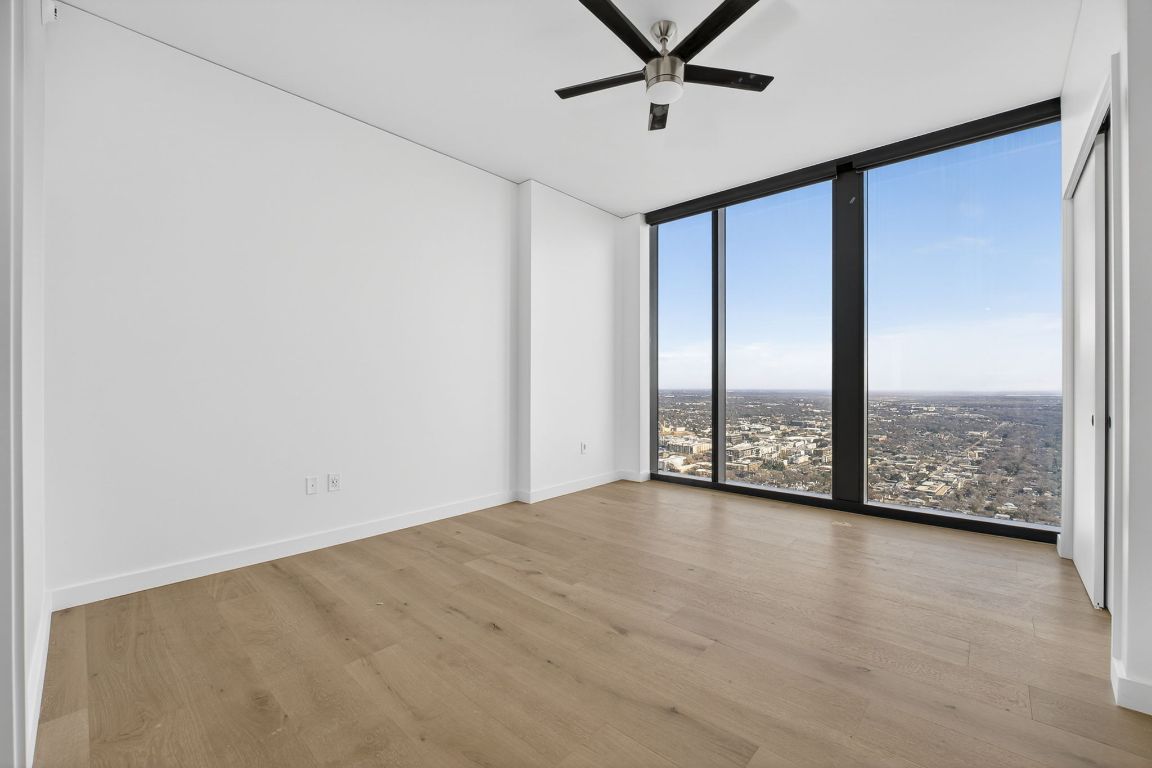 610 Davis Street, Unit 5001 Austin, TX 78701 - Photo 23 of 38 a view of an empty room with a window