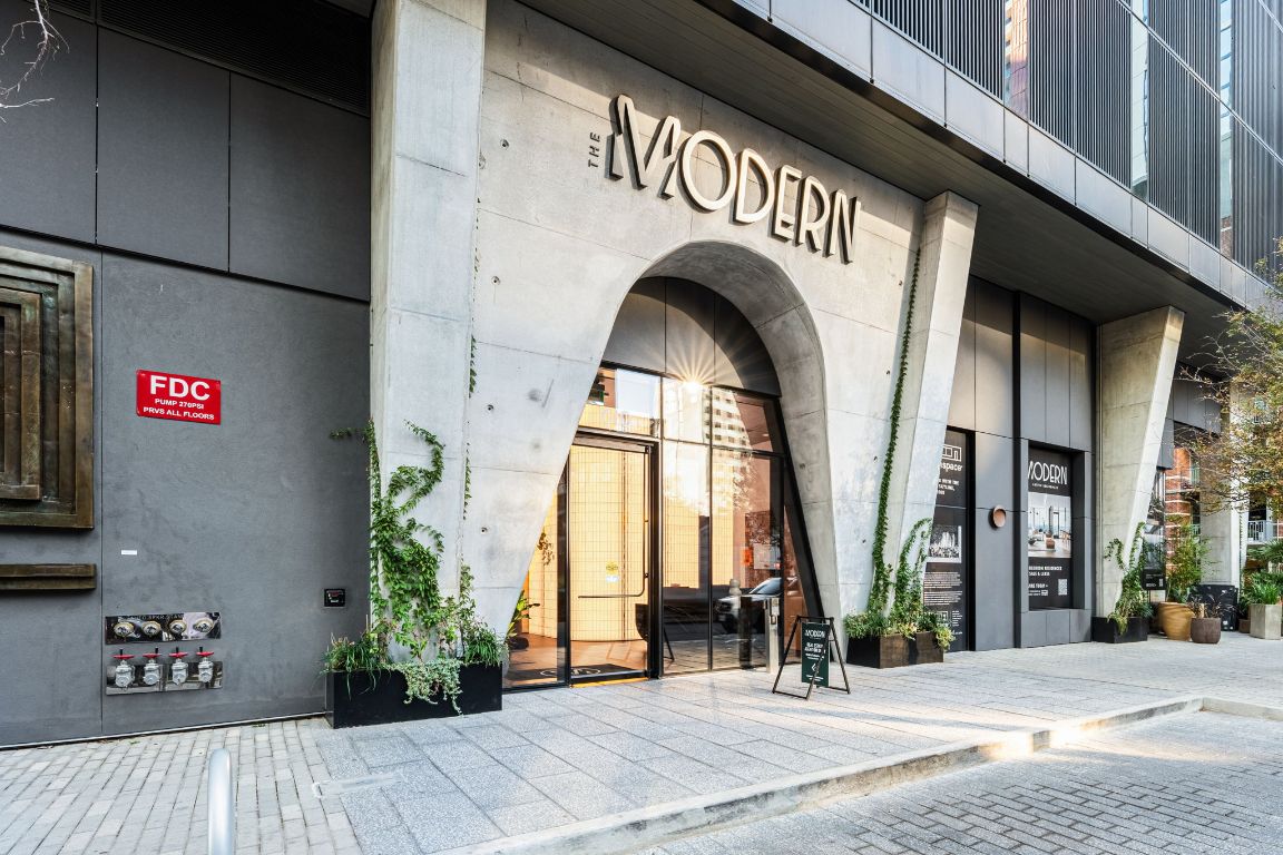 610 Davis Street, Unit 5001 Austin, TX 78701 - Photo 3 of 38 a view of entrance gate of the building