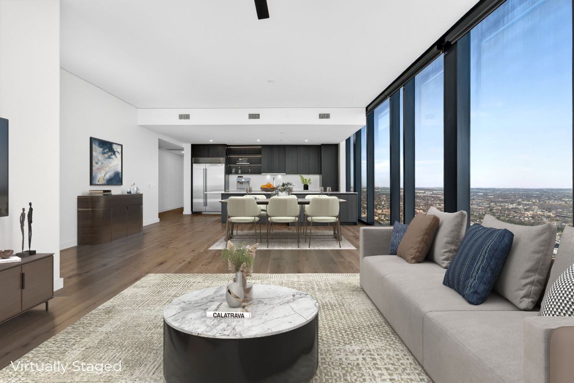 610 Davis Street, Unit 5001 Austin, TX 78701 - Photo 7 of 38 a living room with furniture and a table