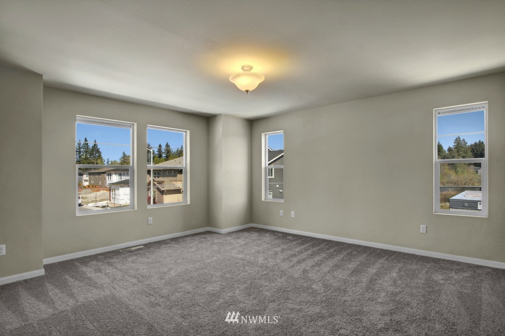 3526 178th Place Southeast, Unit 3012 Bothell, WA 98012 - Photo 11 of 20 a view of an empty room with a window
