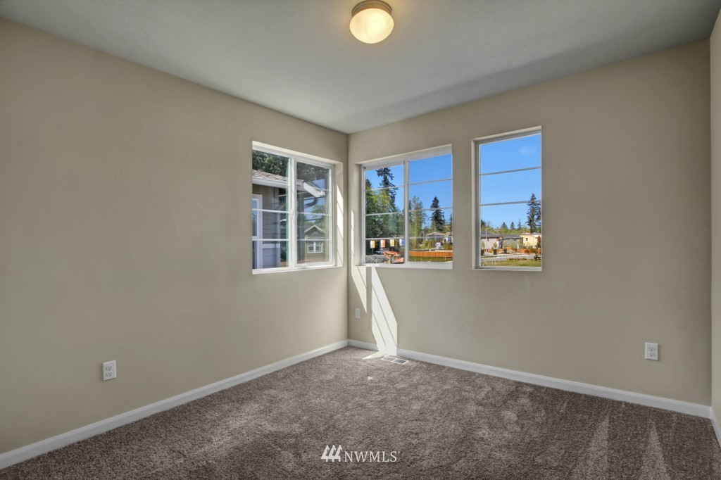 3526 178th Place Southeast, Unit 3012 Bothell, WA 98012 - Photo 15 of 20 a view of livingroom with window and furniture