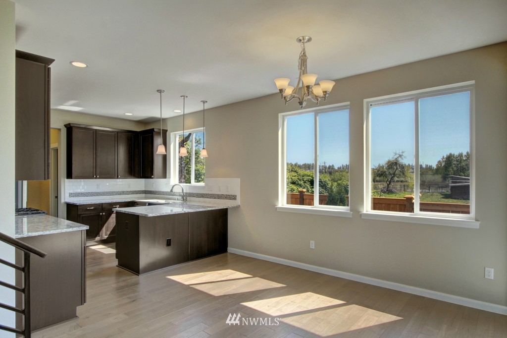 3526 178th Place Southeast, Unit 3012 Bothell, WA 98012 - Photo 7 of 20 a view of kitchen with windows and sink