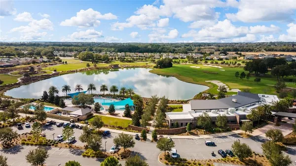 a view of a lake with houses with outdoor space
