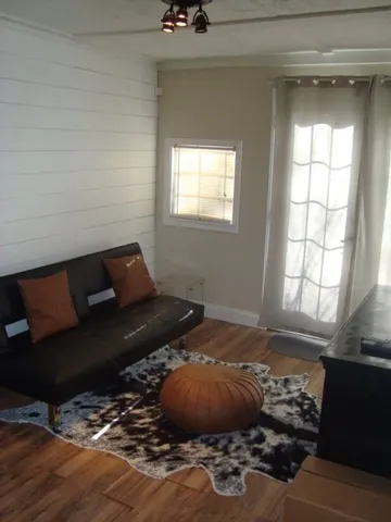 a room with furniture and window